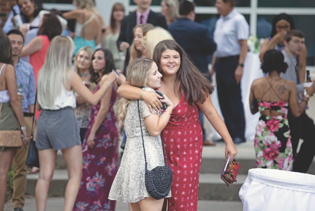 Toast - students hugging