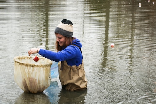 Student cleaning up water