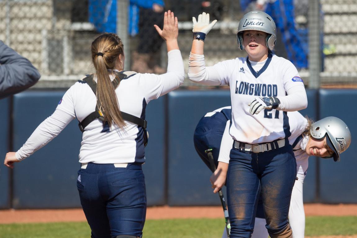 Softball teammates congratulate each other